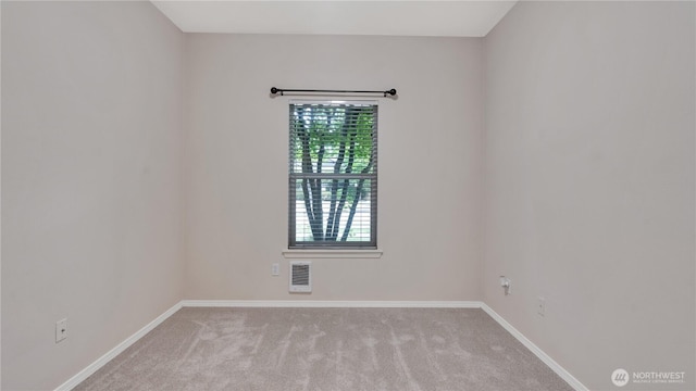 2104 Palisade Blvd Unit B-7, Dupont, WA 98327 - carpeted spare room featuring baseboards