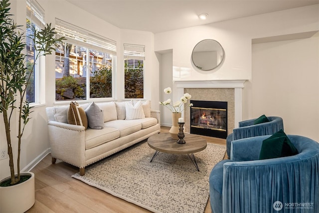 2840 139th Ave SE Unit 16, Bellevue, WA 98005 - living area featuring wood finished floors, a tile fireplace, and recessed lighting