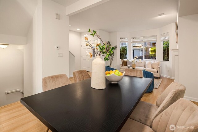 2840 139th Ave SE Unit 16, Bellevue, WA 98005 - dining area with light wood-style flooring and recessed lighting