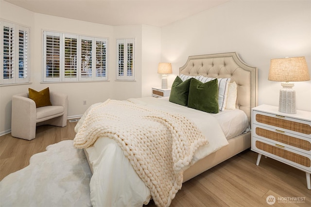 2840 139th Ave SE Unit 16, Bellevue, WA 98005 - bedroom with wood finished floors and baseboards