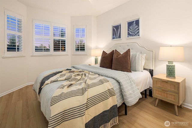 2840 139th Ave SE Unit 16, Bellevue, WA 98005 - bedroom featuring wood finished floors and baseboards