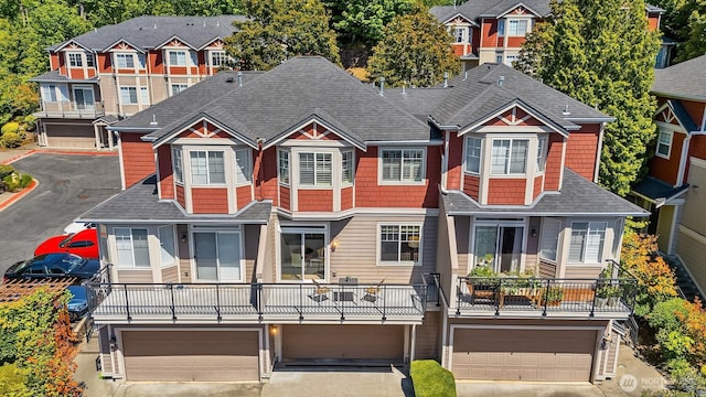 2840 139th Ave SE Unit 16, Bellevue, WA 98005 - multi unit property featuring asphalt driveway, a garage, and a shingled roof