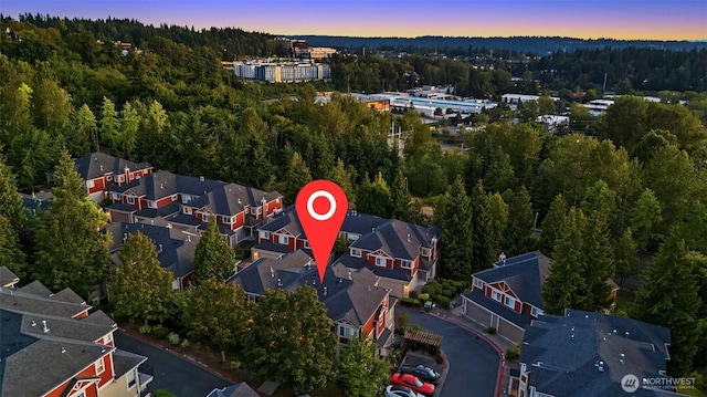 2840 139th Ave SE Unit 16, Bellevue, WA 98005 - aerial view of property and surrounding area with a heavily wooded area and nearby suburban area