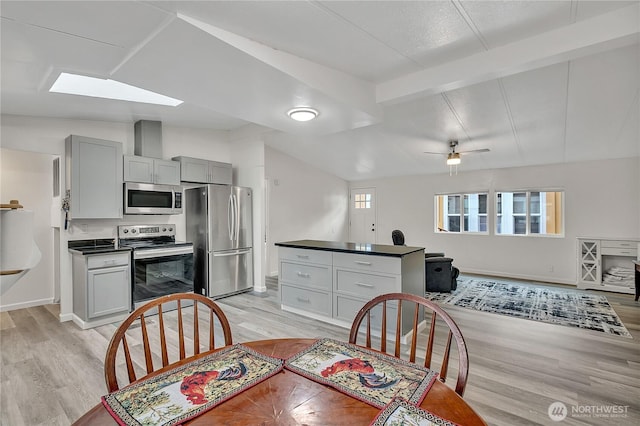 22111 108th Ave SE Unit 5, Kent, WA 98031 - dining room featuring light wood-type flooring and ceiling fan