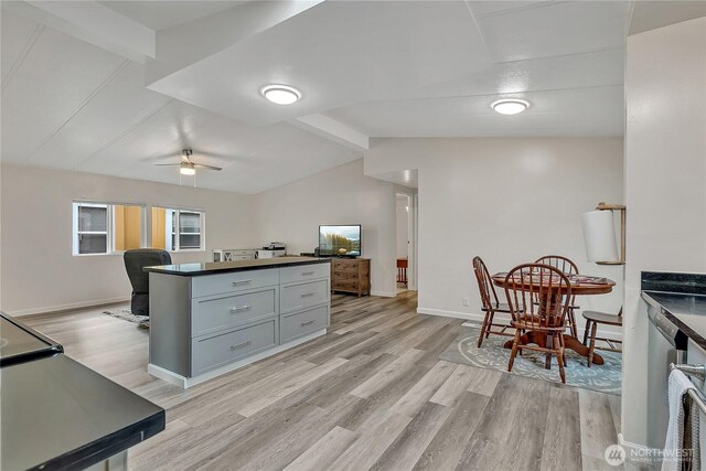 22111 108th Ave SE Unit 5, Kent, WA 98031 - kitchen with light wood finished floors, dark countertops, gray cabinetry, and a desk