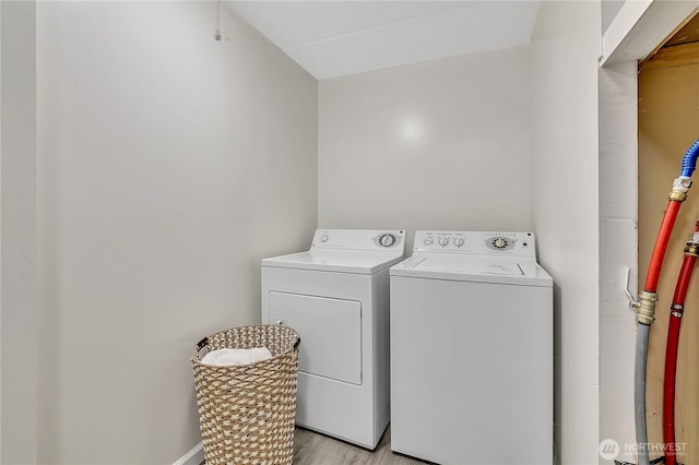 22111 108th Ave SE Unit 5, Kent, WA 98031 - laundry room featuring independent washer and dryer and light wood-type flooring