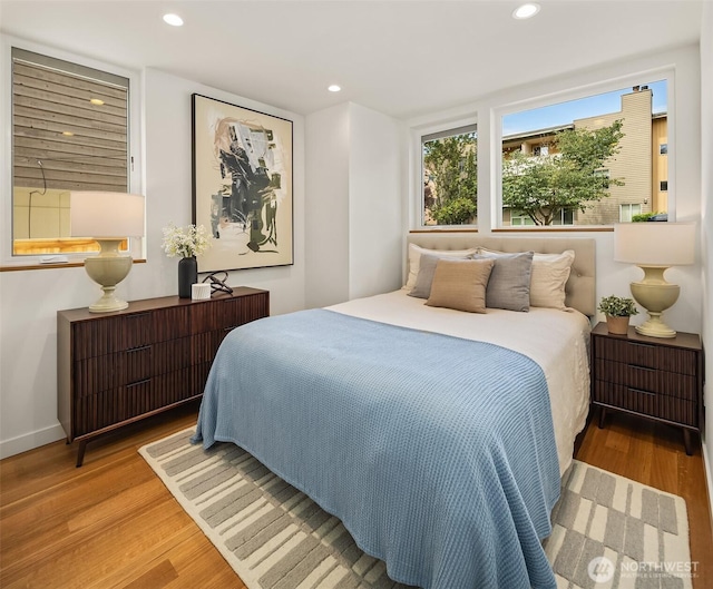 2419 NW 57th Unit B, Seattle, WA 98107 - bedroom featuring wood finished floors and recessed lighting