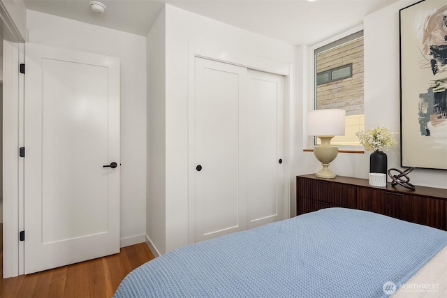 2419 NW 57th Unit B, Seattle, WA 98107 - bedroom with wood finished floors and a closet