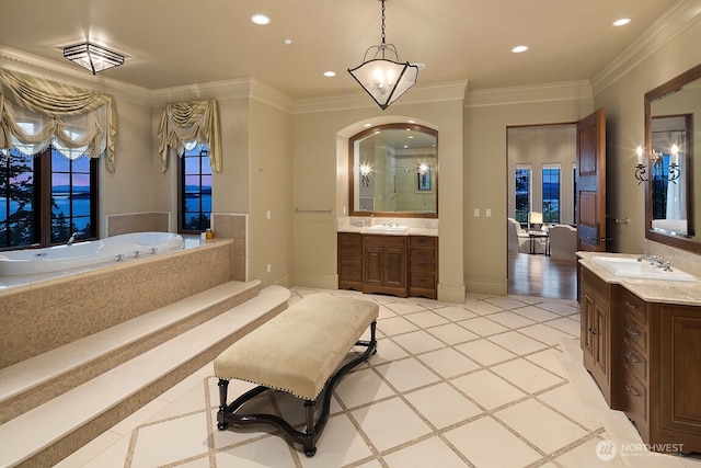 678 Primrose Ln, Friday Harbor, WA 98250 - bathroom with two vanities, inlaid floor details, a garden tub, recessed lighting, and a shower