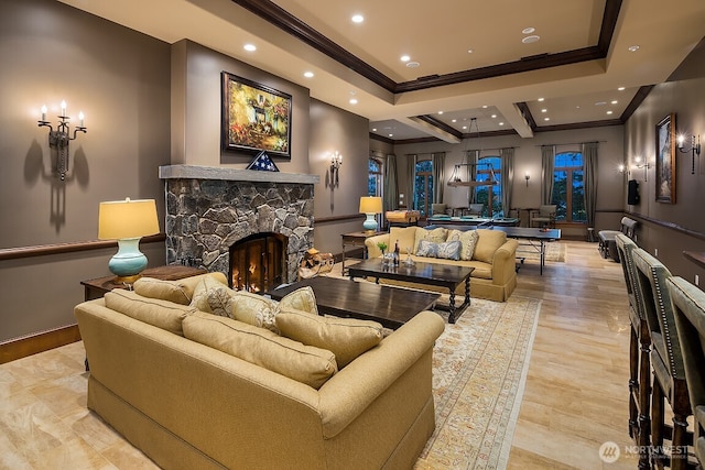 678 Primrose Ln, Friday Harbor, WA 98250 - living area with a stone fireplace, crown molding, recessed lighting, and light wood-style floors