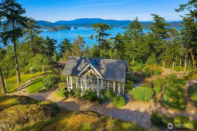 678 Primrose Ln, Friday Harbor, WA 98250 - aerial view of property and surrounding area featuring a water and mountain view