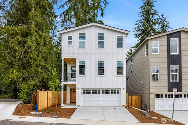9 160th St SE, Bothell, WA 98012 - view of front of property with board and batten siding, an attached garage, and concrete driveway