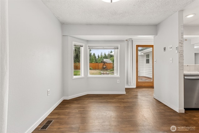 15627 SE 263rd Pl, Covington, WA 98042 - unfurnished room featuring wood finished floors and a textured ceiling