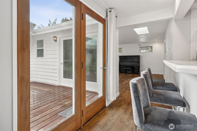 15627 SE 263rd Pl, Covington, WA 98042 - doorway featuring a skylight and wood finished floors