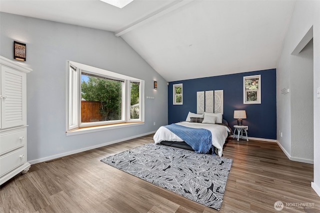15627 SE 263rd Pl, Covington, WA 98042 - bedroom with wood finished floors and a skylight