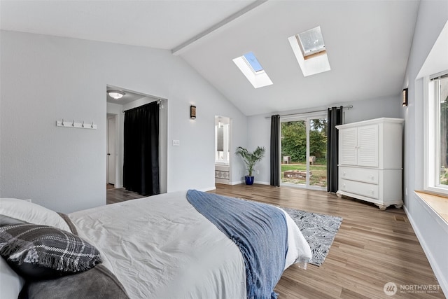 15627 SE 263rd Pl, Covington, WA 98042 - bedroom featuring a skylight and wood finished floors