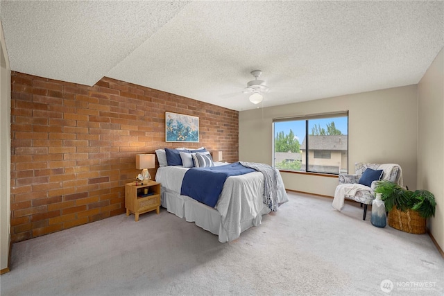 10637 Glen Acres Dr S Unit 10637, Seattle, WA 98168 - bedroom with brick wall, carpet, a textured ceiling, and ceiling fan