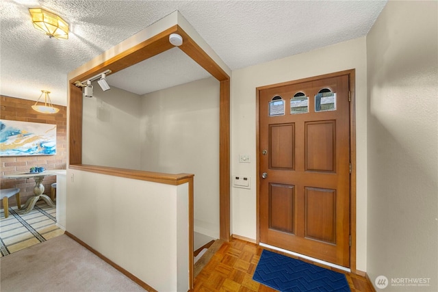 10637 Glen Acres Dr S Unit 10637, Seattle, WA 98168 - entryway with a textured ceiling