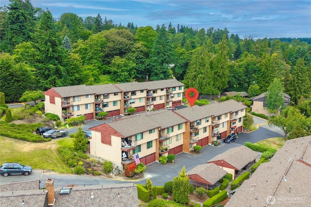 10637 Glen Acres Dr S Unit 10637, Seattle, WA 98168 - aerial view of residential area with a forest