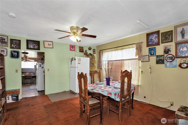 1109 S 61st St, Tacoma, WA 98408 - carpeted dining space with ceiling fan and water heater