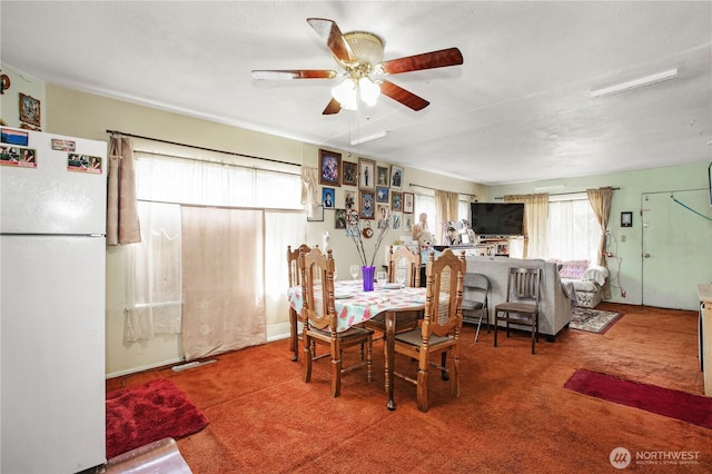 1109 S 61st St, Tacoma, WA 98408 - dining space with ceiling fan and carpet floors