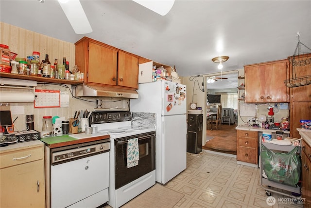 1109 S 61st St, Tacoma, WA 98408 - kitchen featuring white appliances, extractor fan, light countertops, and light flooring