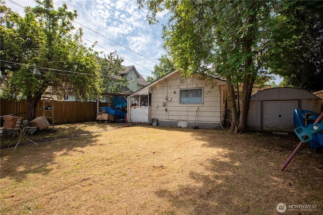 1109 S 61st St, Tacoma, WA 98408 - back of house with a shed