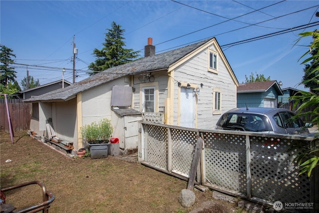 1109 S 61st St, Tacoma, WA 98408 - back of property featuring a chimney