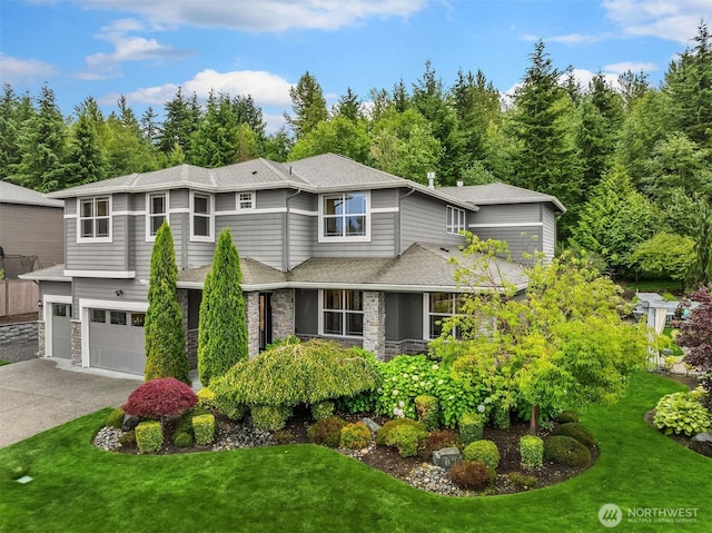 19501 58th Ave SE, Bothell, WA 98012 - prairie-style home with driveway, an attached garage, stone siding, and a front yard
