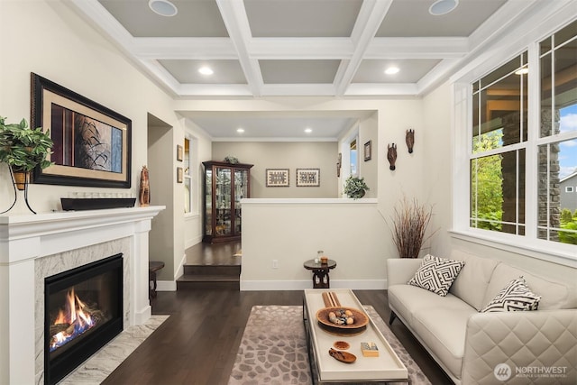 19501 58th Ave SE, Bothell, WA 98012 - living area with dark wood-style flooring, beamed ceiling, a fireplace, coffered ceiling, and recessed lighting