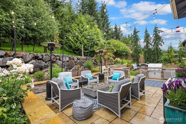 19501 58th Ave SE, Bothell, WA 98012 - view of patio / terrace featuring an outdoor fire pit and an outdoor kitchen