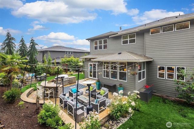 19501 58th Ave SE, Bothell, WA 98012 - back of property with outdoor lounge area, a patio area, and a sunroom