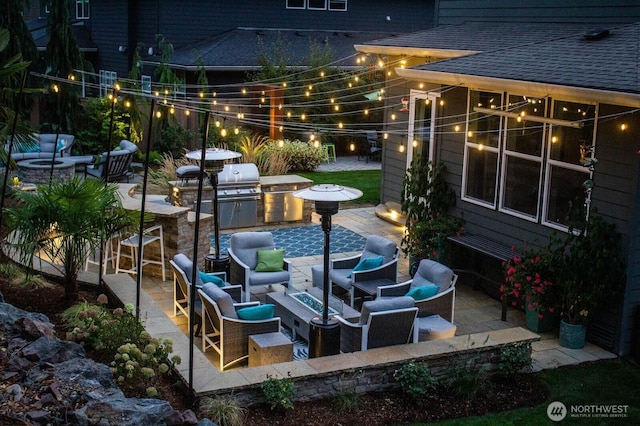 19501 58th Ave SE, Bothell, WA 98012 - view of patio with exterior kitchen, an outdoor living space with a fire pit, and a bar