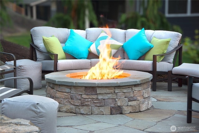 19501 58th Ave SE, Bothell, WA 98012 - view of patio / terrace featuring an outdoor fire pit