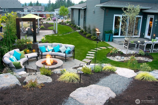 19501 58th Ave SE, Bothell, WA 98012 - view of grassy yard featuring an outdoor living space with a fire pit, a patio area, and a gazebo