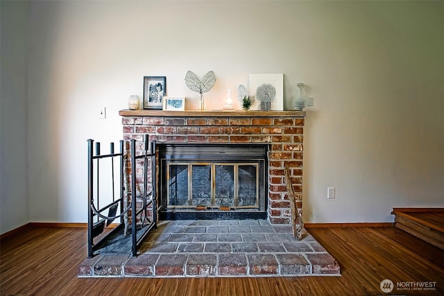 960 NE Marwood Dr, Bremerton, WA 98310 - detailed view of a brick fireplace and wood finished floors