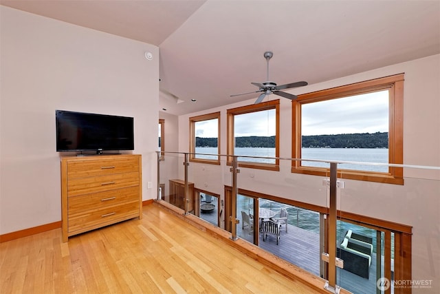 11261 E State Route 106, Union, WA 98592 - unfurnished living room with wood finished floors, ceiling fan, and lofted ceiling