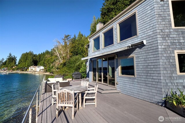 11261 E State Route 106, Union, WA 98592 - wooden deck with a water view, grilling area, and outdoor dining area
