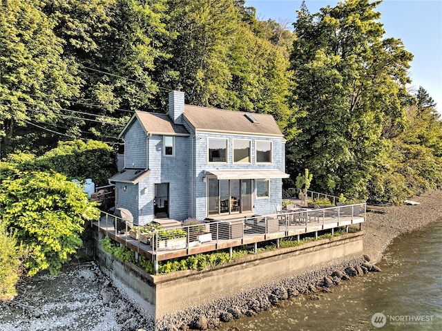 11261 E State Route 106, Union, WA 98592 - back of property featuring a chimney and a deck with water view