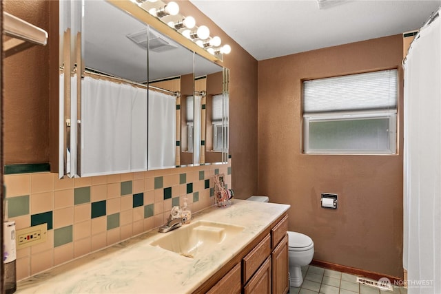 1714 N Astor Ct, East Wenatchee, WA 98802 - bathroom with backsplash, vanity, tile patterned floors, and curtained shower