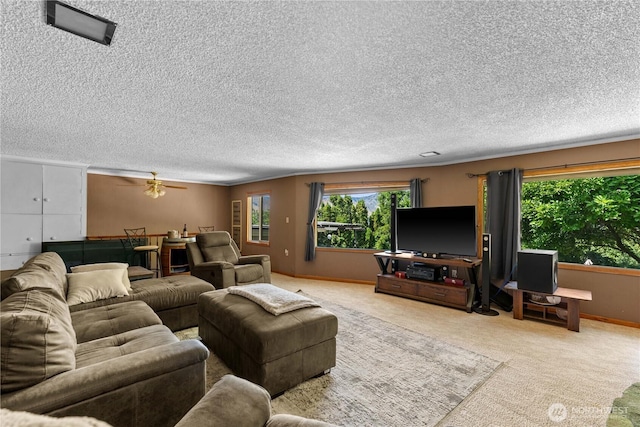1714 N Astor Ct, East Wenatchee, WA 98802 - living area featuring healthy amount of natural light, carpet flooring, a textured ceiling, and ceiling fan