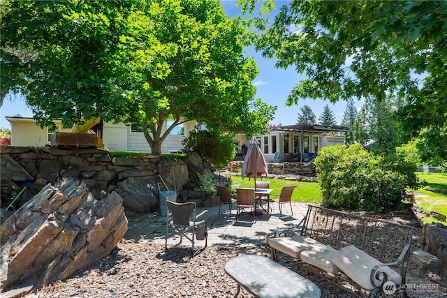 1714 N Astor Ct, East Wenatchee, WA 98802 - view of yard featuring a patio area and outdoor dining space