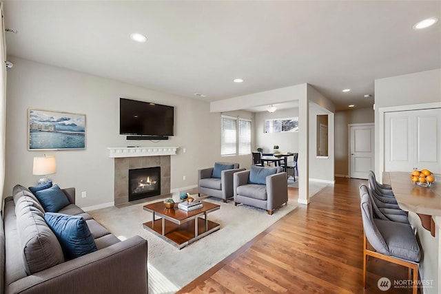 3389 52nd Ave E, Fife, WA 98424 - living area featuring recessed lighting, light wood-style flooring, and a tile fireplace