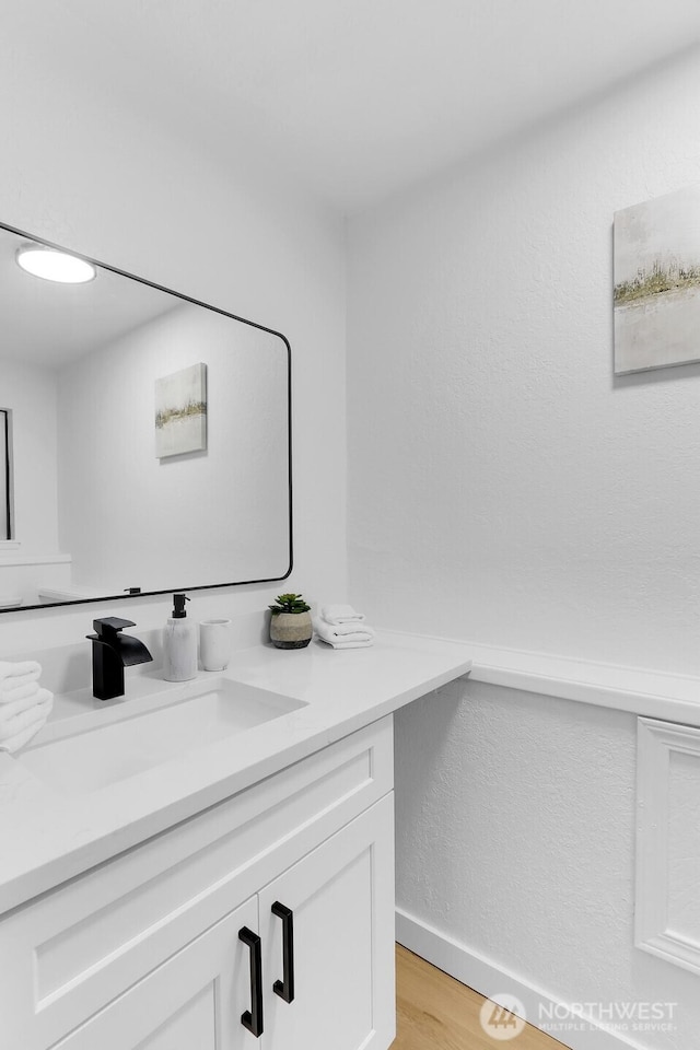 11214 80th Ave NE, Kirkland, WA 98034 - bathroom with vanity and wood finished floors