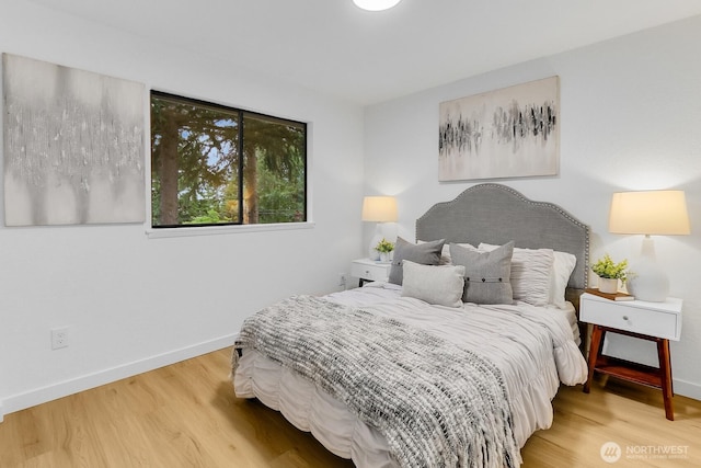 11214 80th Ave NE, Kirkland, WA 98034 - bedroom featuring baseboards and wood finished floors