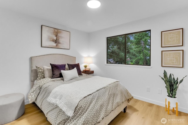 11214 80th Ave NE, Kirkland, WA 98034 - bedroom featuring wood finished floors and baseboards