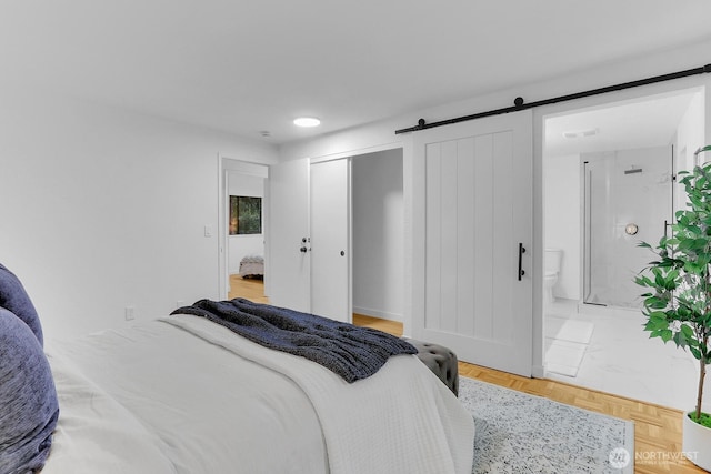 11214 80th Ave NE, Kirkland, WA 98034 - bedroom with a barn door and connected bathroom