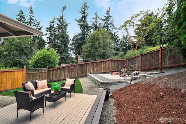 11214 80th Ave NE, Kirkland, WA 98034 - wooden terrace featuring outdoor lounge area, a fenced backyard, view of wooded area, and a patio