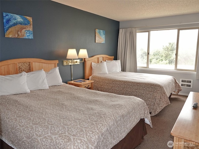 615 Ocean Shores Blvd NW Unit 210, Ocean Shores, WA 98569 - bedroom featuring carpet flooring and a textured ceiling
