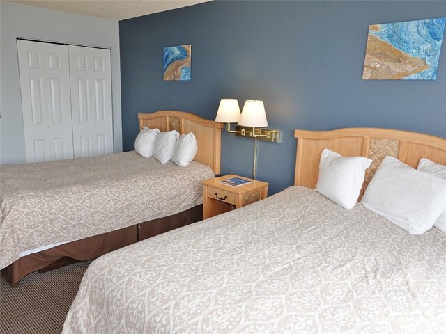 615 Ocean Shores Blvd NW Unit 210, Ocean Shores, WA 98569 - bedroom featuring a closet